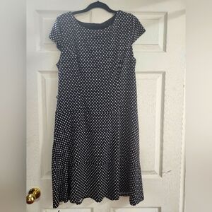 Black and white polkadot dress.